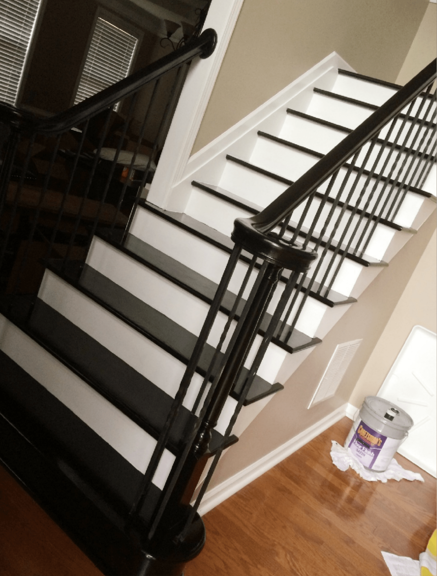 staircase repair and hallway hardwood refinishing project by final floors atlanta
